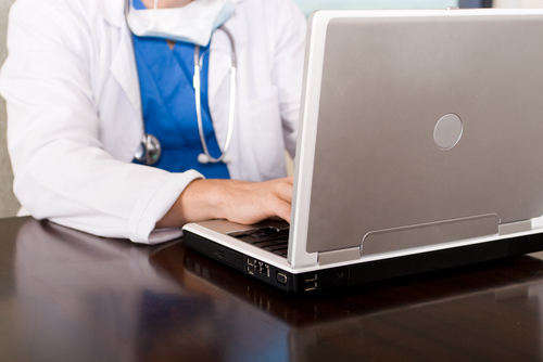 Doctor on computer.jpg